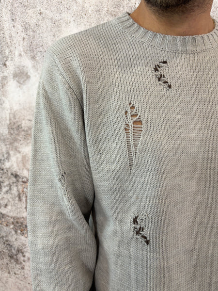 Maglione sabbia rotture e cuciture