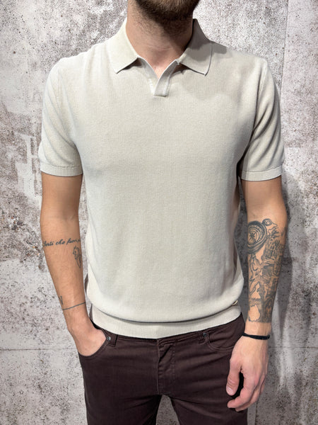 Polo beige in maglia effetto slavato