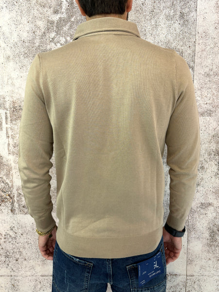 Polo in maglia beige manica lunga