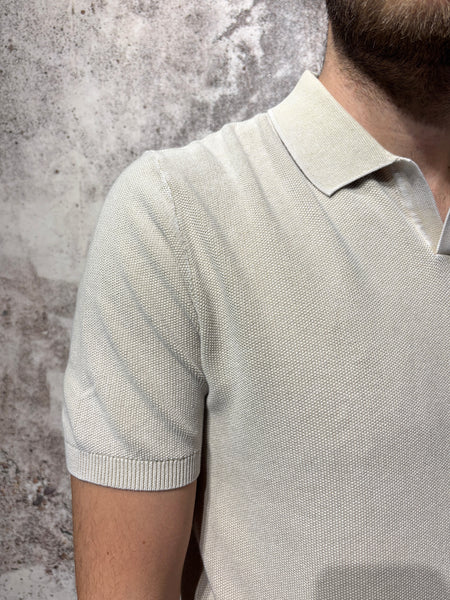 Polo beige in maglia effetto slavato