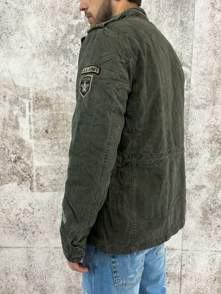 Field jacket militare con patch e rotture