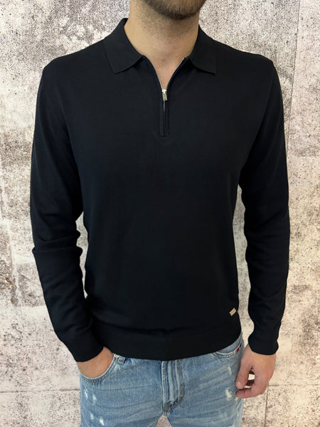 Polo nera con zip manica lunga
