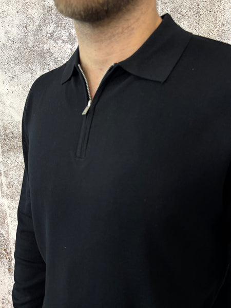 Polo nera con zip manica lunga