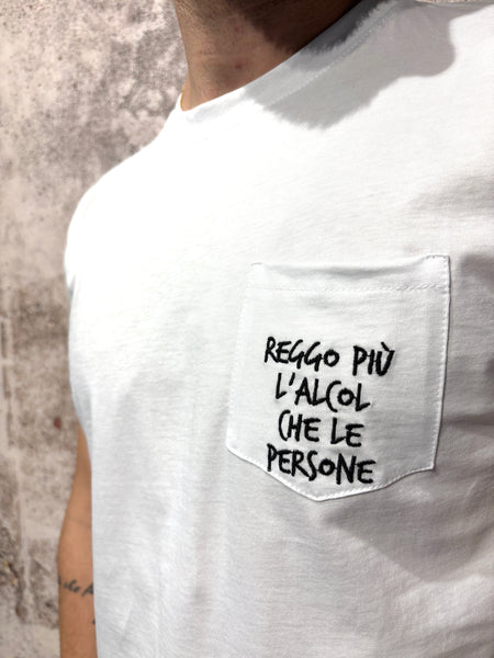 White T-shirt with embroidered text pocket