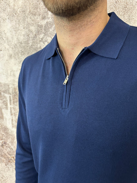 Polo blu con zip manica lunga