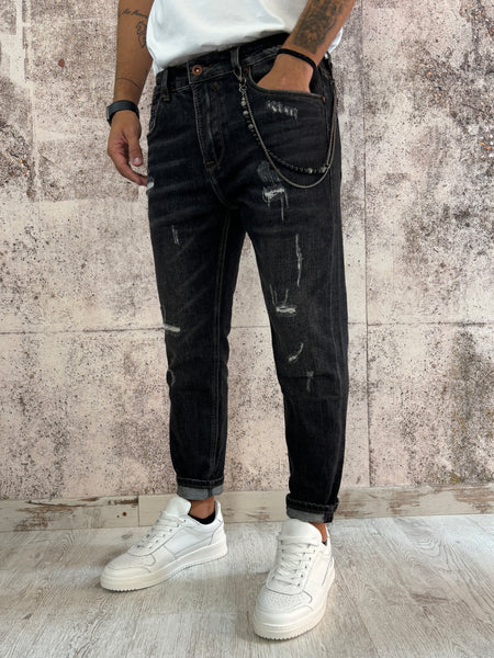 Jeans nero Carrot fit con piccole rotture