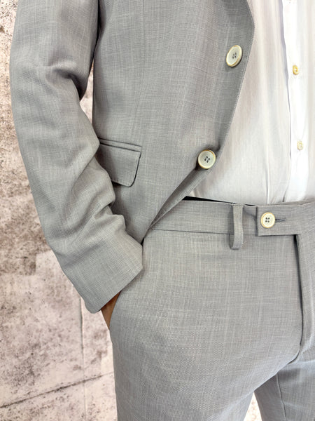 Abito monopetto grigio tessuto fiammato