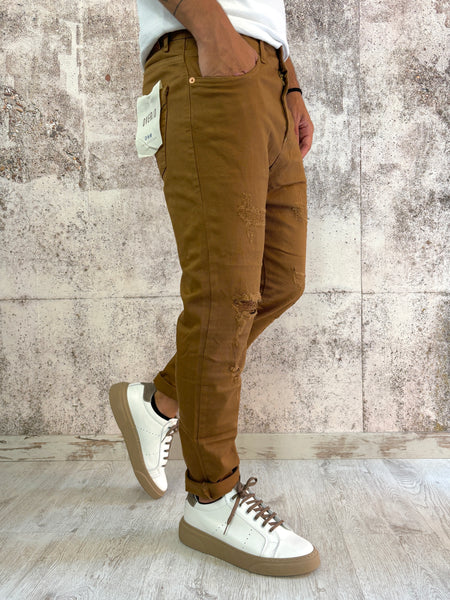 Jeans tabacco tapered fit con rotture