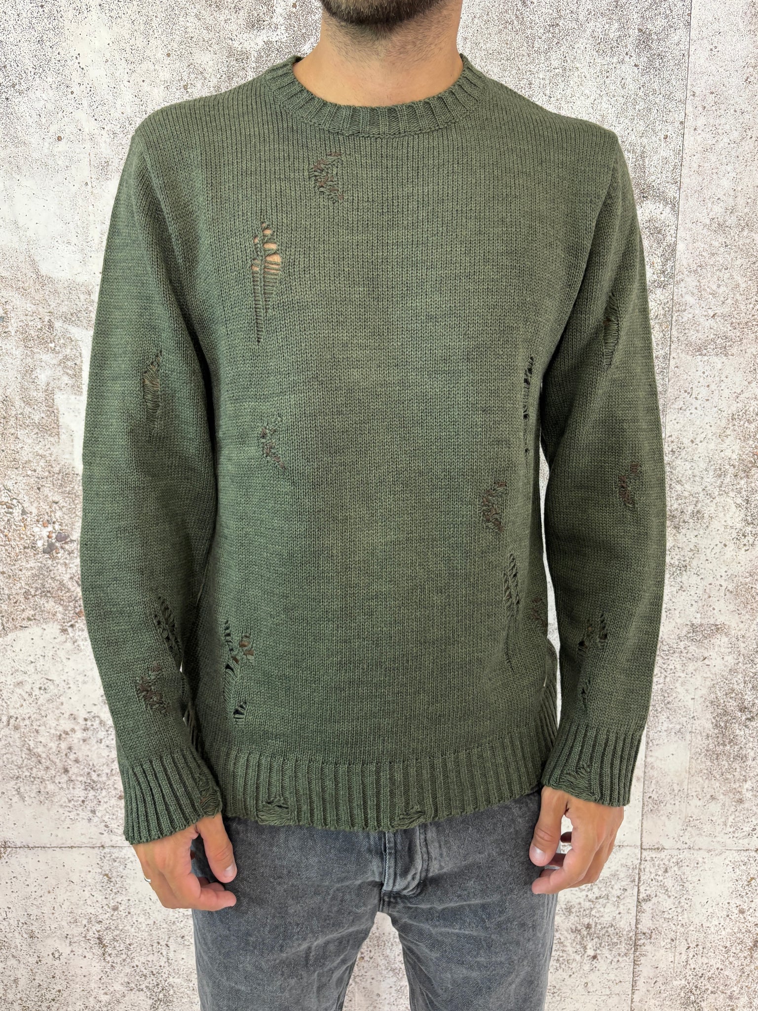 Maglione verdone rotture e cuciture