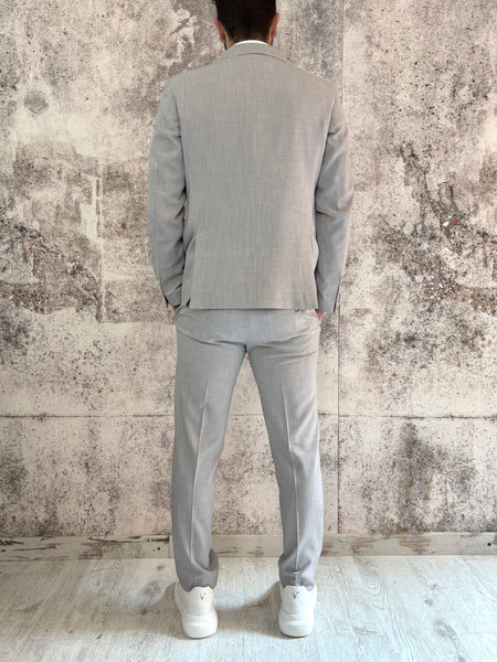 Abito monopetto grigio tessuto fiammato