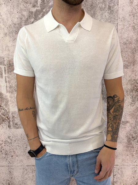 Polo in maglia bianca collo derby