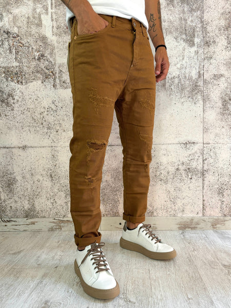 Jeans tabacco tapered fit con rotture