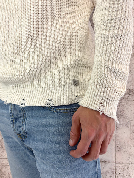 Cream sweater with rips