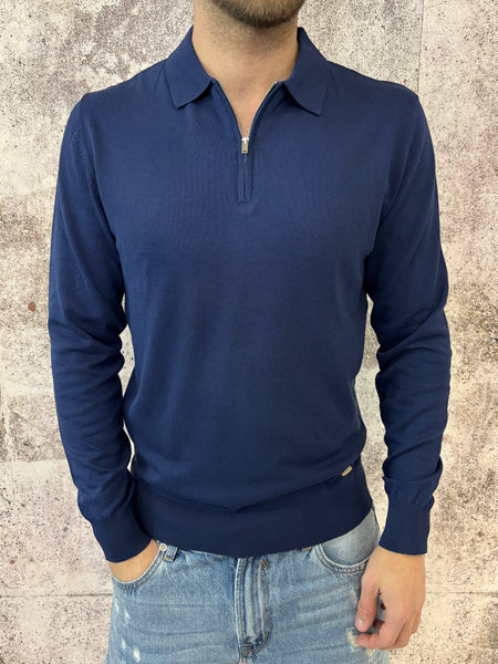 Polo blu con zip manica lunga