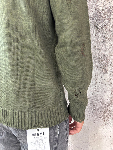 Maglione verdone rotture e cuciture