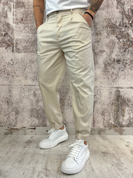 Pantalone sartoriale beige con una pince
