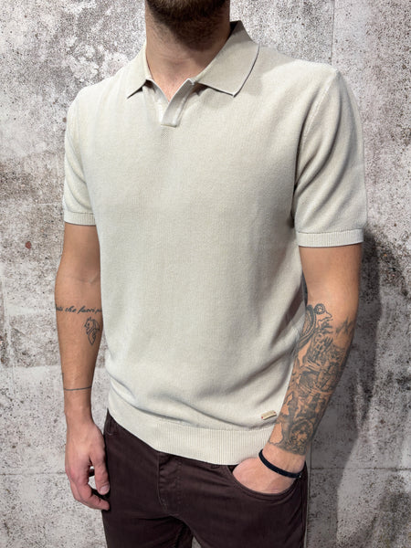 Polo beige in maglia effetto slavato